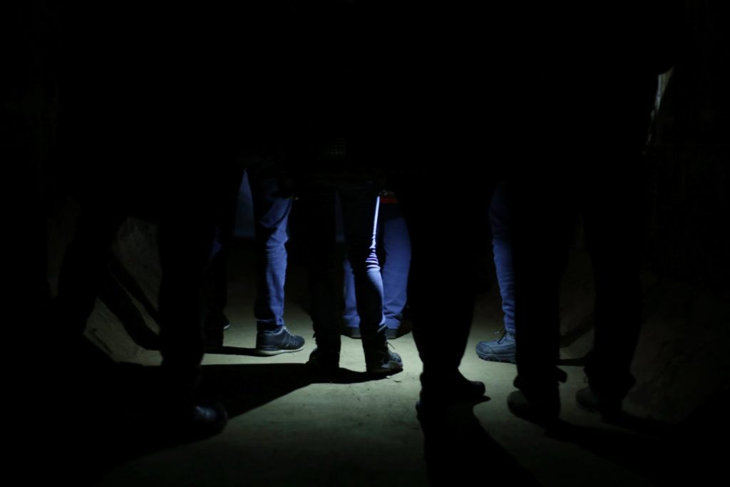 Group of people in the dark