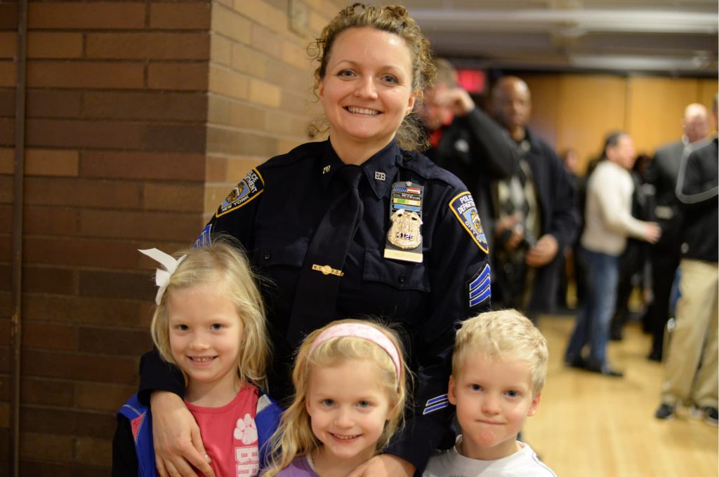 Policewoman with children
